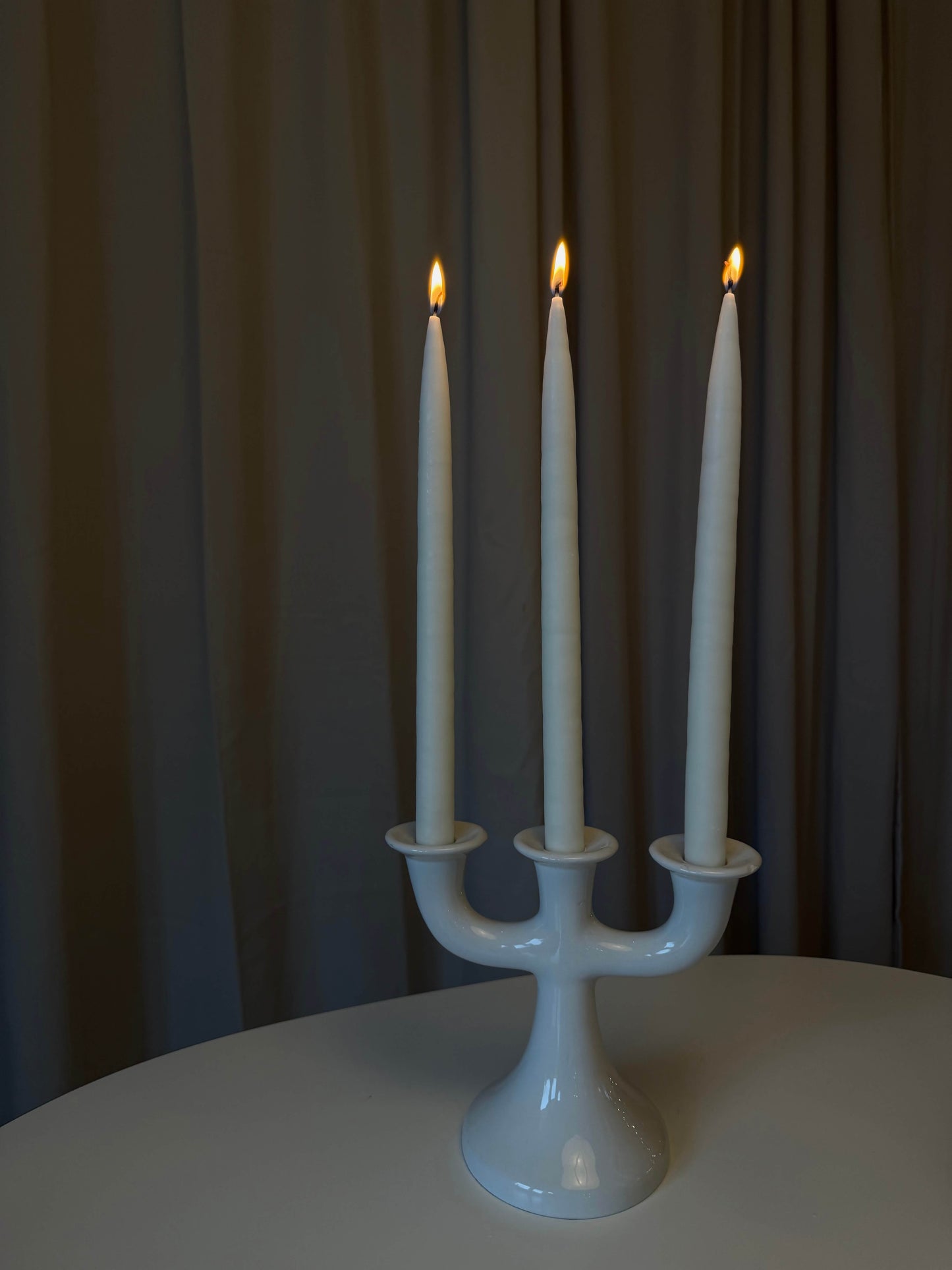 Trehovedet lysestage