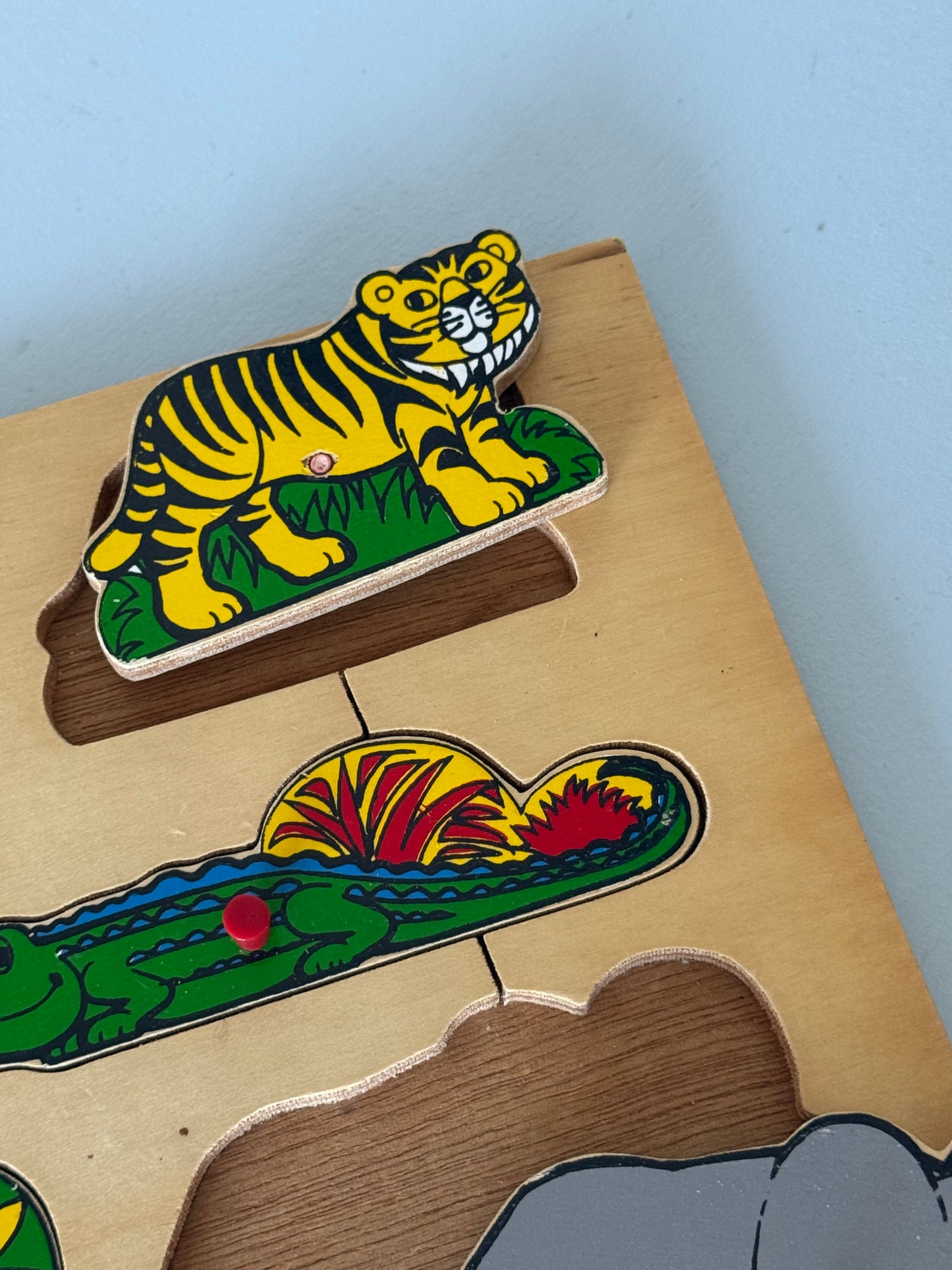 Træpuslespil med eksotiske dyr