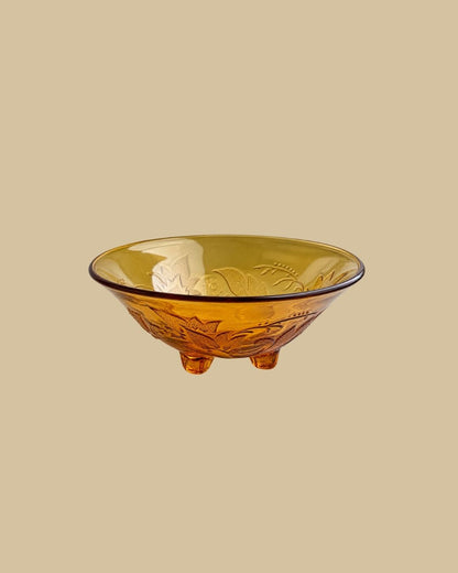 Orange glasskål på fødder