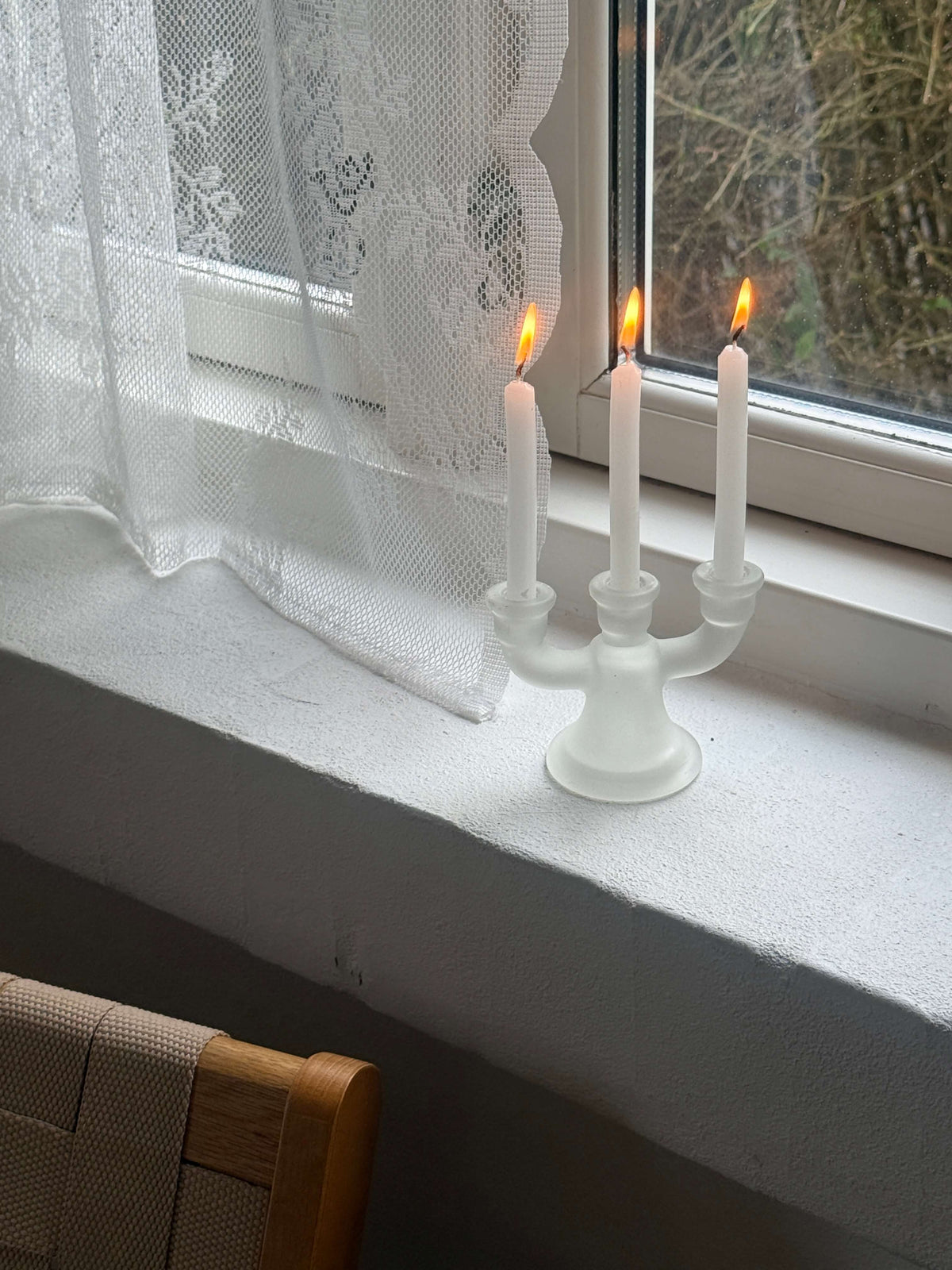 Lysestage i matteret glas
