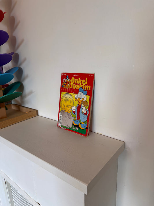 Onkel Joakim bog i rødt bind